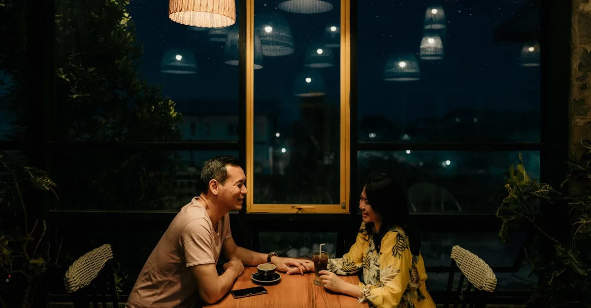 Couple enjoying a romantic evening at a restaurant — the kind of curated introductions a full-service dating agency provides