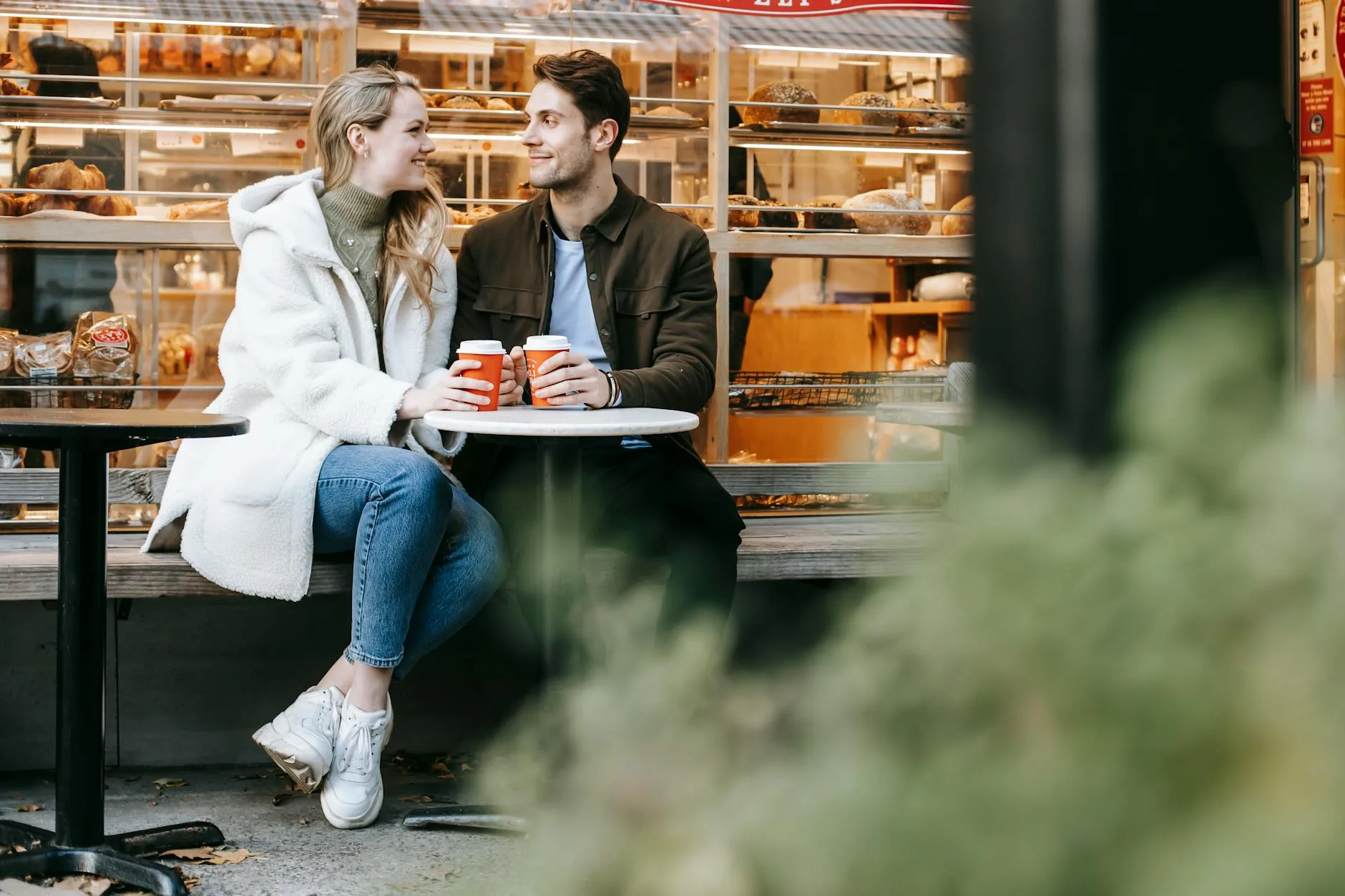 Young couple enjoying a coffee date arranged through a professional matchmaking service